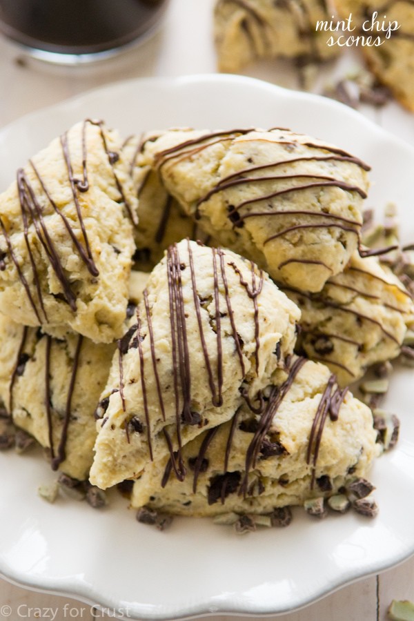 The perfect Mint Chip Scones! This recipe produces soft and pillowy scones, filled with mint chip pieces and chocolate!
