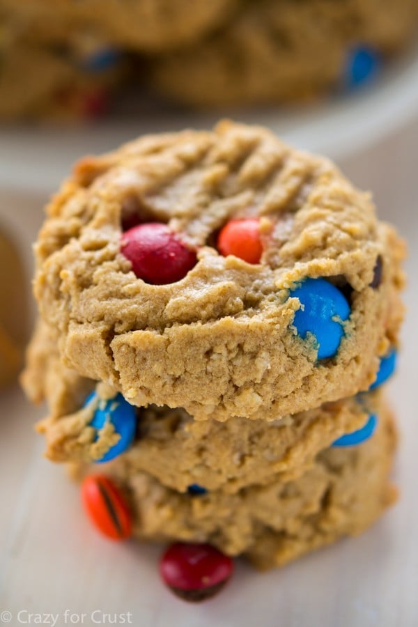 Gluten Free Monster Cookies are full of peanut butter, gluten free oats, and candy. No one will miss the gluten!