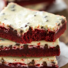 Stack of Red Velvet Chocolate Chip Cheesecake Bars