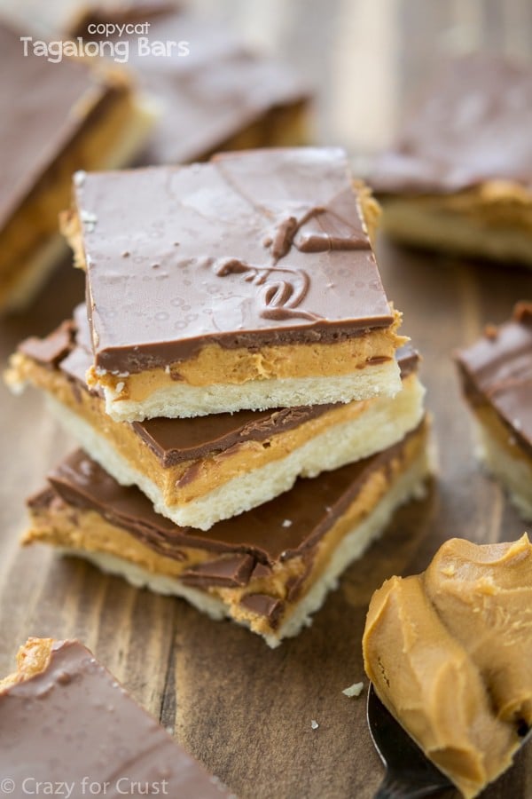 Homemade Tagalong Bars - a copycat of the girl scout cookie! Shortbread, peanut butter, and chocolate in bar cookie form!