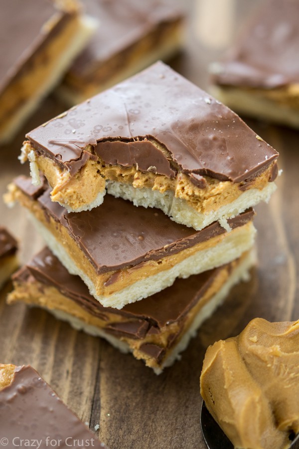 Homemade Tagalong Bars - a copycat of the girl scout cookie! Shortbread, peanut butter, and chocolate in bar cookie form!