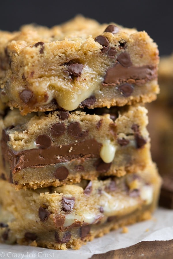Chocolate Chip Gooey Bars - the perfect chocolate chip cookie bar filled with sweetened condensed milk and tons of chocolate.