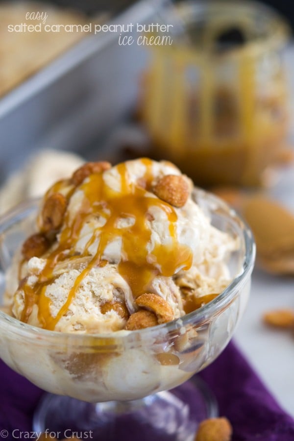 Scoops of easy salted caramel peanut butter ice cream in a glass dish with purple napkin underneath