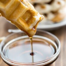 peanut butter sandwich waffle stick dipped in syrup