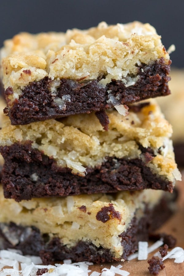 brownie layer with coconut cookies on top, stack of cookie bars