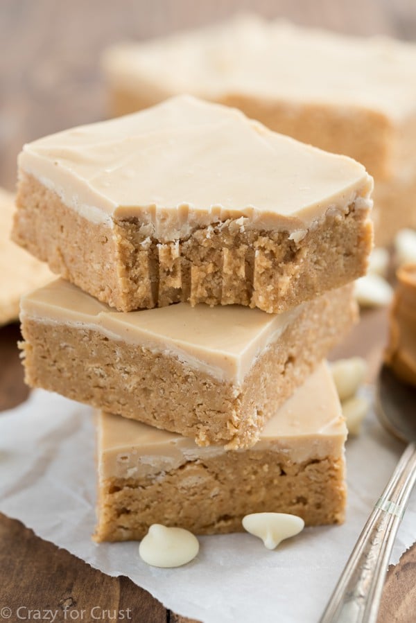 Stack of double Peanut Butter Bars with a bite out of the top one