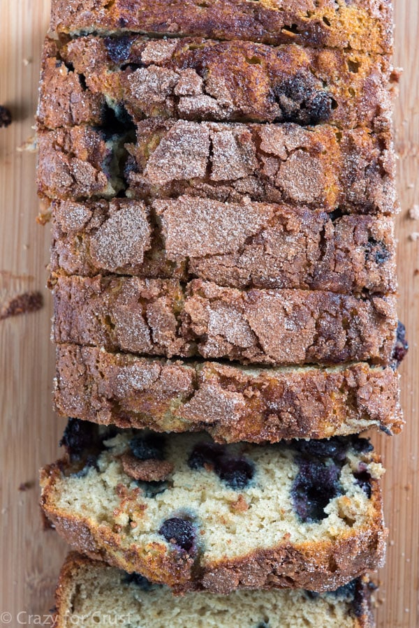Cinnamon Sugar Blueberry Banana Bread is a great way to use overripe bananas! Easy and foolproof this quick bread is full of blueberries and cinnamon sugar!