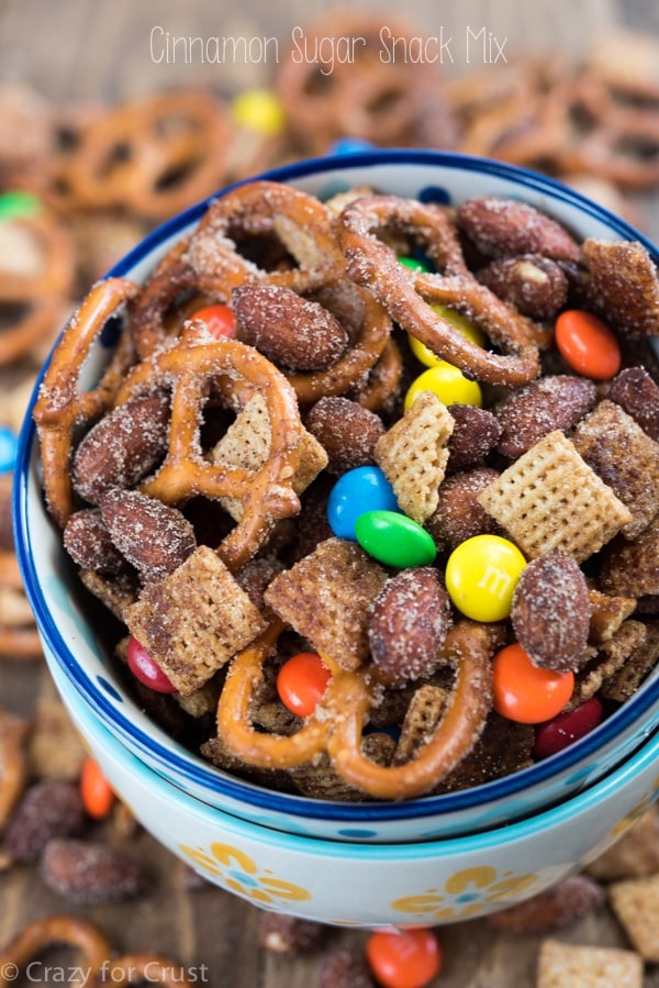 This Cinnamon Sugar Snack Mix is and easy recipe, fast and foolproof. It's filled with pretzels, almonds, candy, Chex, and cinnamon sugar!