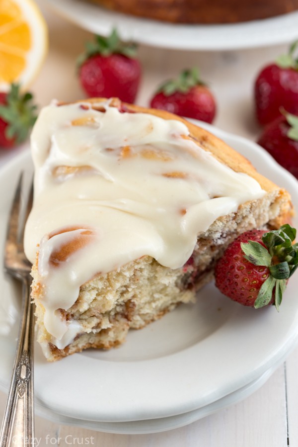 Giant Strawberry Cinnamon Roll Cake Recipe made with fresh strawberries and lemon cream cheese icing!