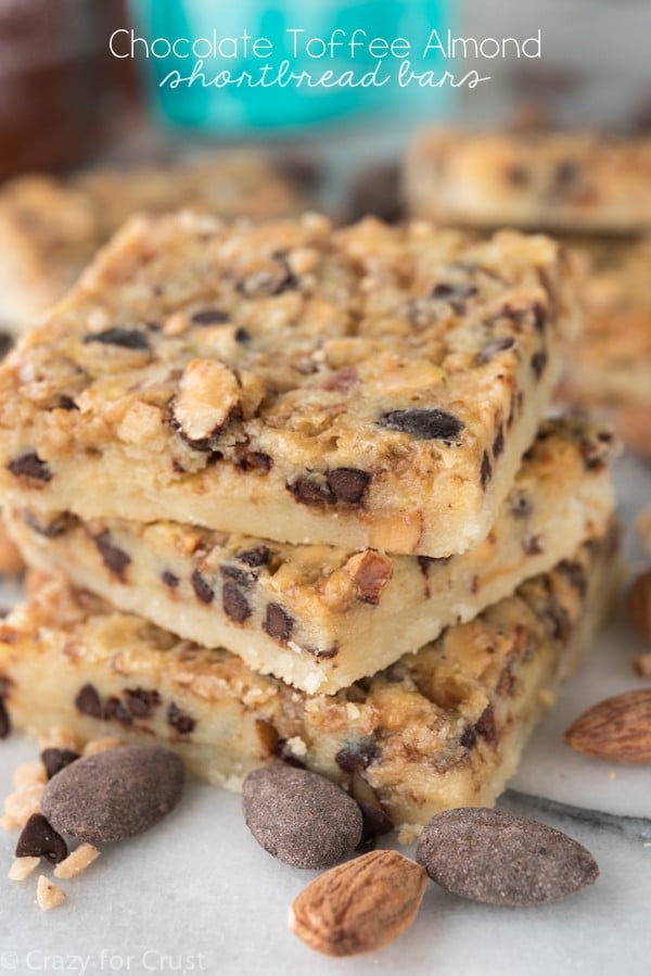 These Chocolate Toffee Almond Shortbread Bars have a thick shortbread crust and a gooey filling with chocolate, toffee, and almonds! 