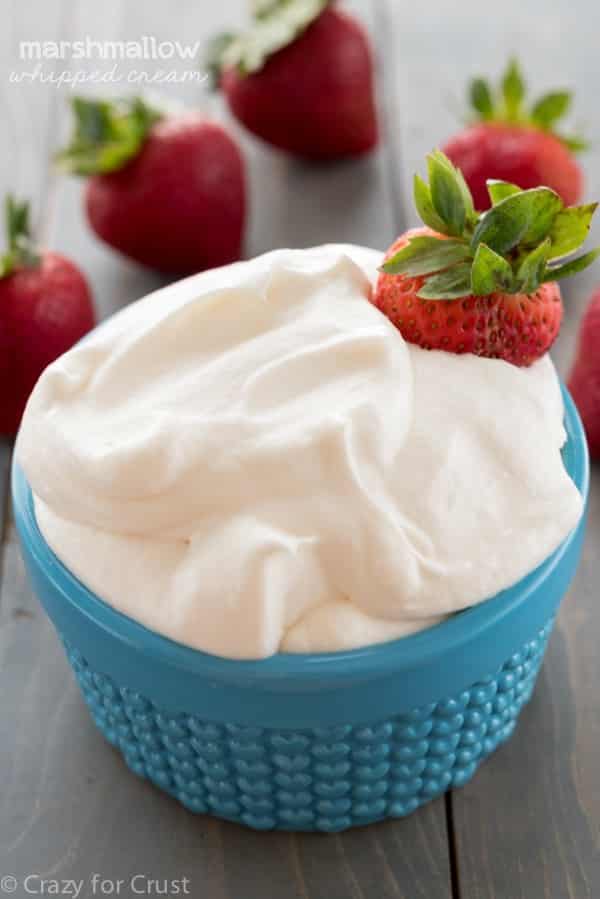 Marshmallow Whipped Cream - an easy recipe with just 3 ingredients! It's the perfect fruit dip or topping for pancakes or cake!