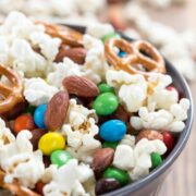 Homemade Kettle Corn Snack Mix in a dark bowl