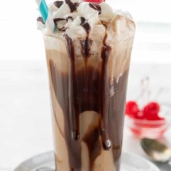 Iced Coffee Soda in a tall glass with a straw