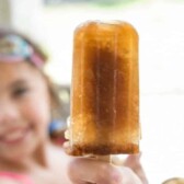 Girl holding a Soda Popsicle