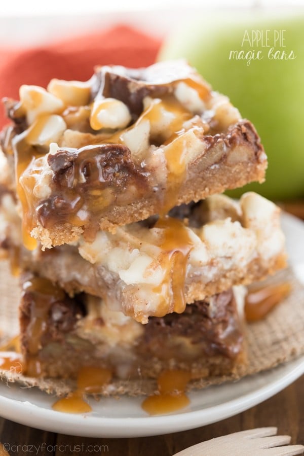 Stack of caramel apple pie magic bars on white plate