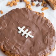 Football Cookie Cake on parchment paper