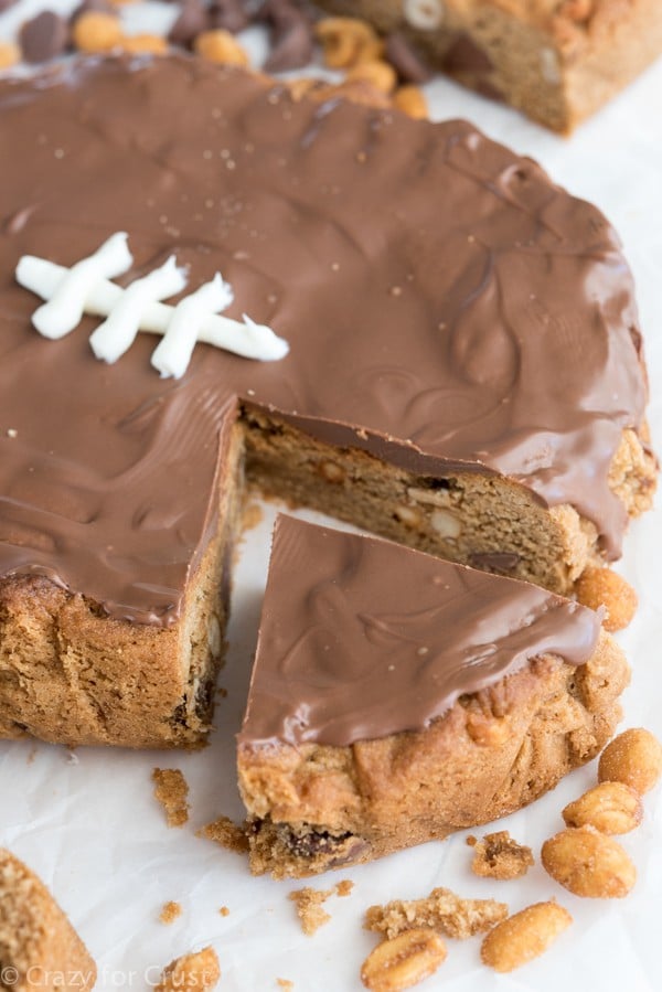 Football Cookie Cake with one slice cut out