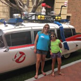 Mom and Daughter in front of the Ghost Busters car at Sony Pictures