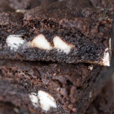 stack of oreo cookie bars with words on photo