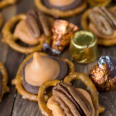 Several Pumpkin Spice Pretzels on a wood table