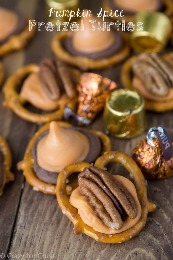 These Pumpkin Spice Pretzel Turtles have only 4 ingredients and are done in minutes! It's such an easy recipe for fall. Use up those fun Hershey's Kisses!