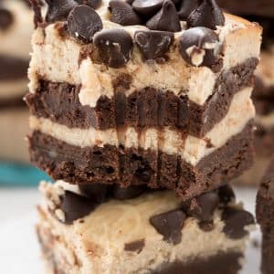 Stack of 4 Layer Peanut Butter Cheesecake Brownies