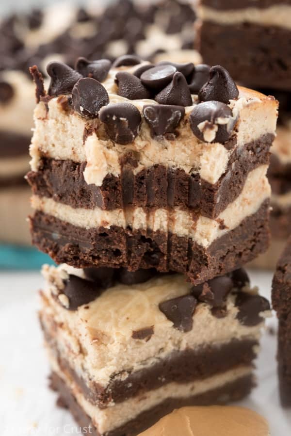 4 Layer Peanut Butter Cheesecake Brownies - this EPIC dessert is actually easy! Four layers of brownie and peanut butter cheesecake make an indulgent dessert!