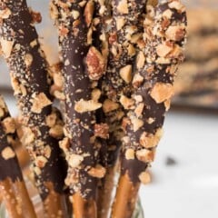 Dark Chocolate Almond Dipped Pretzels in a clear jar