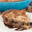 Slice of Double Chocolate Pecan Pie on a white plate