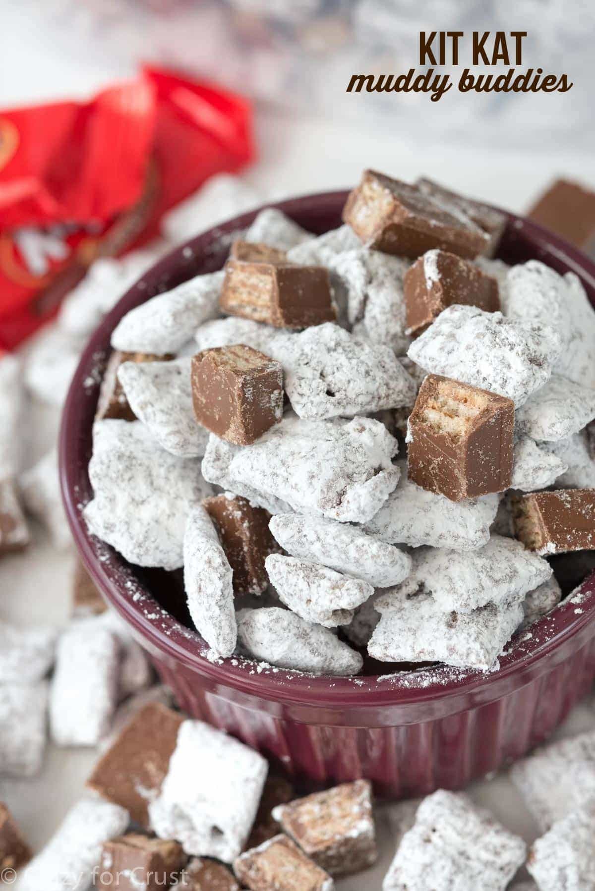 Kit Kat Muddy Buddies - this easy recipe is PERFECT for the Holidays! It's a great party snack or wrapped up as a homemade holiday gift!