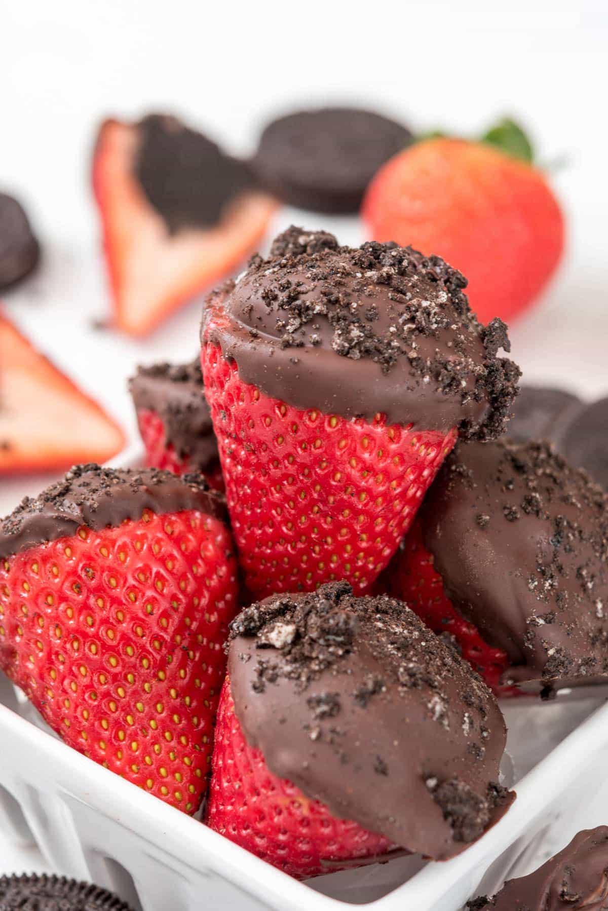 Oreo Truffle Dipped Strawberries - stuff strawberries with Oreo Truffles! I want a dozen of these today!