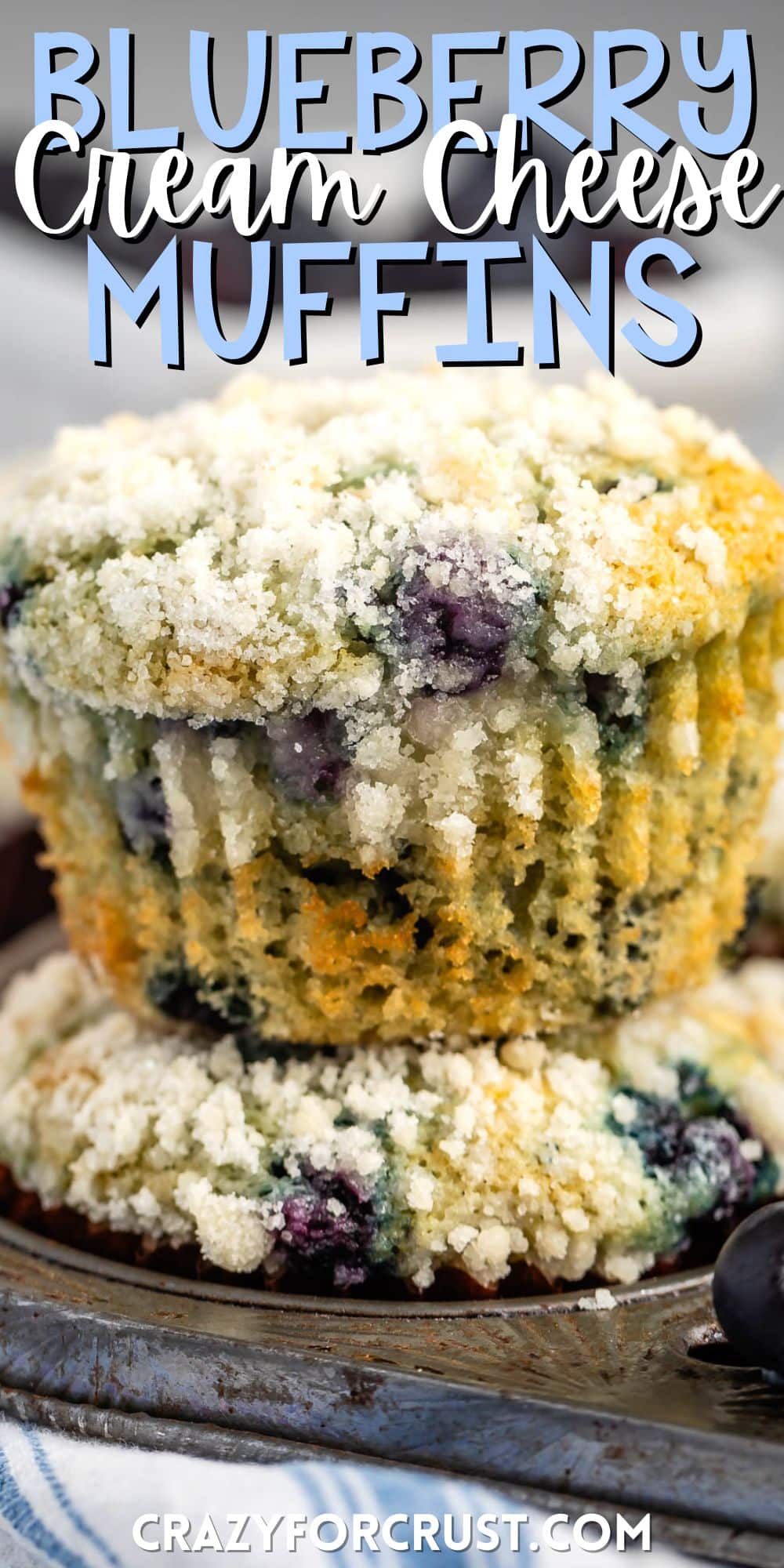 muffins with cream cheese and blueberries inside stacked together with words on the image.
