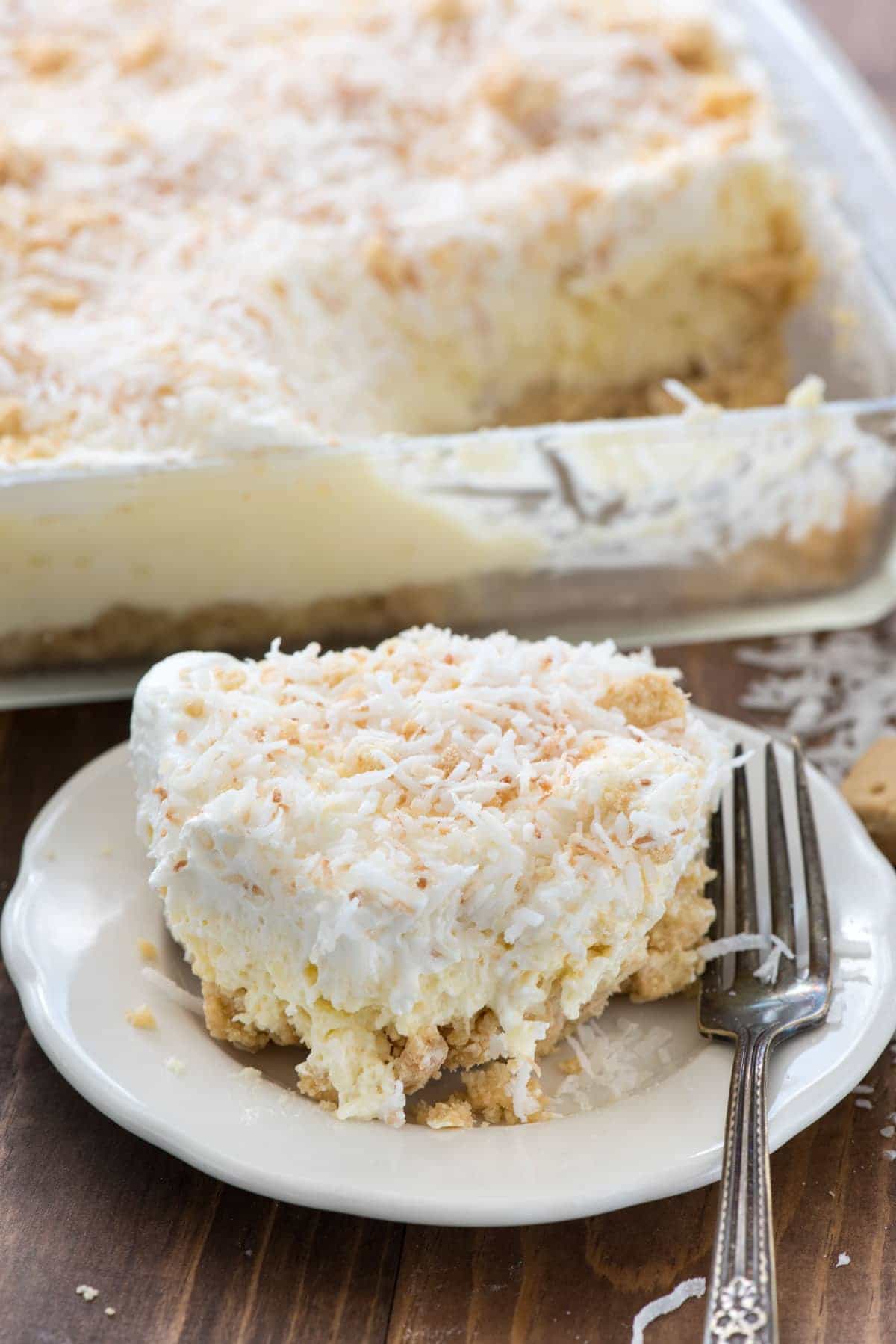 Coconut Cheesecake No Bake Dessert - an easy no bake recipe! This Coconut Delight is filled with cheesecake flavor and a shortbread crust.