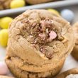 Stack of cadbury egg cookies with cadbury candies around it