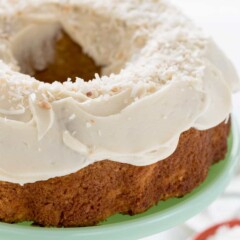 Coconut carrot cake on mint green cake stand