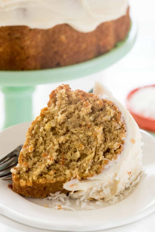 slice of cake mix bundt cake on a white plate with a fork