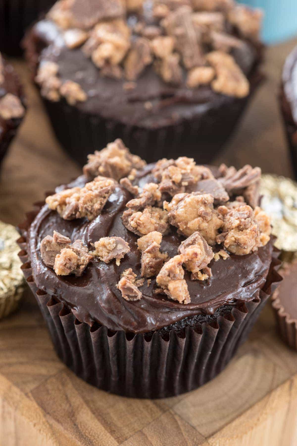 Peanut Butter Cup Cupcakes - chocolate cupcakes filled with peanut butter filling and topped with the BEST frosting!