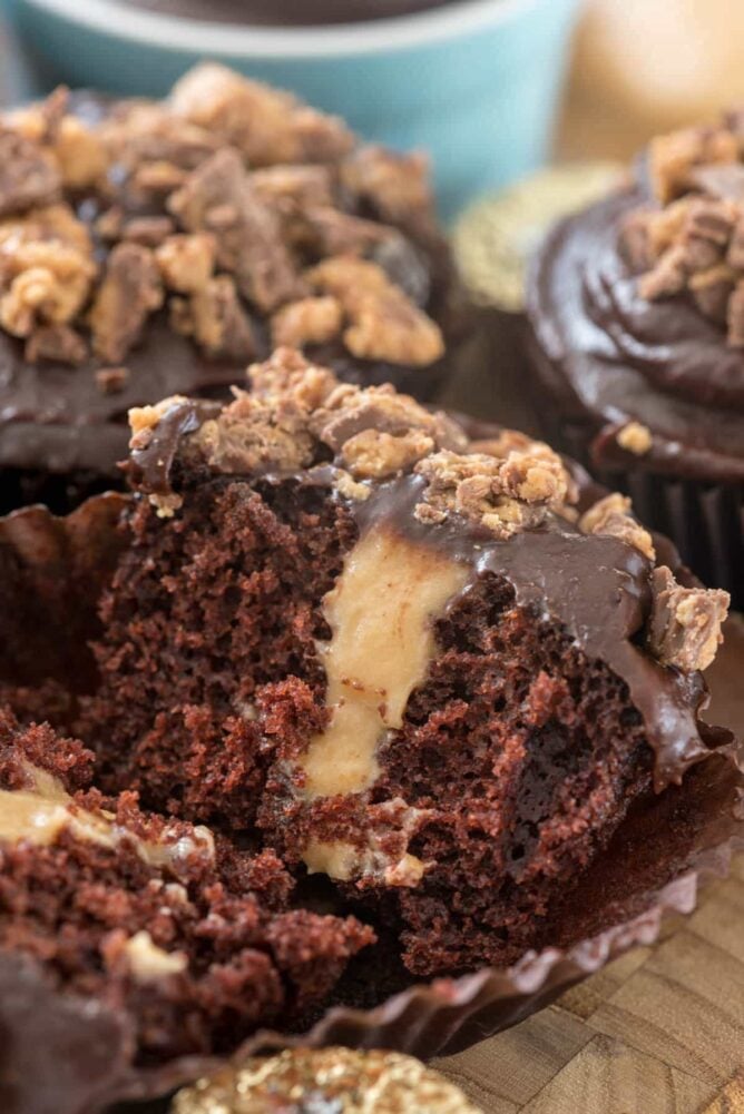 Split open pic of a peanut butter cup cupcake.