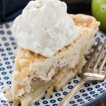 slice of crumb apple pie with ice cream