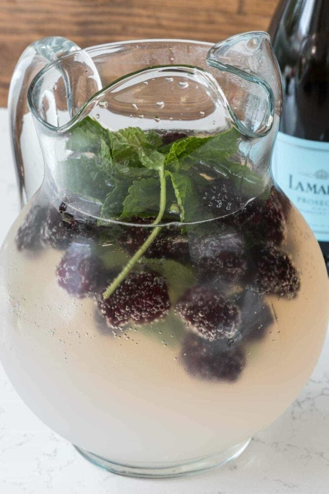 Lemon Prosecco Punch in a glass Pitcher