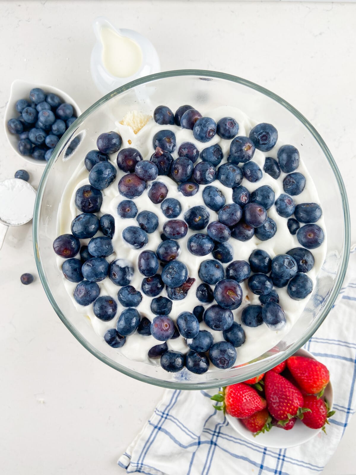 trifle dish with blueberries on top.