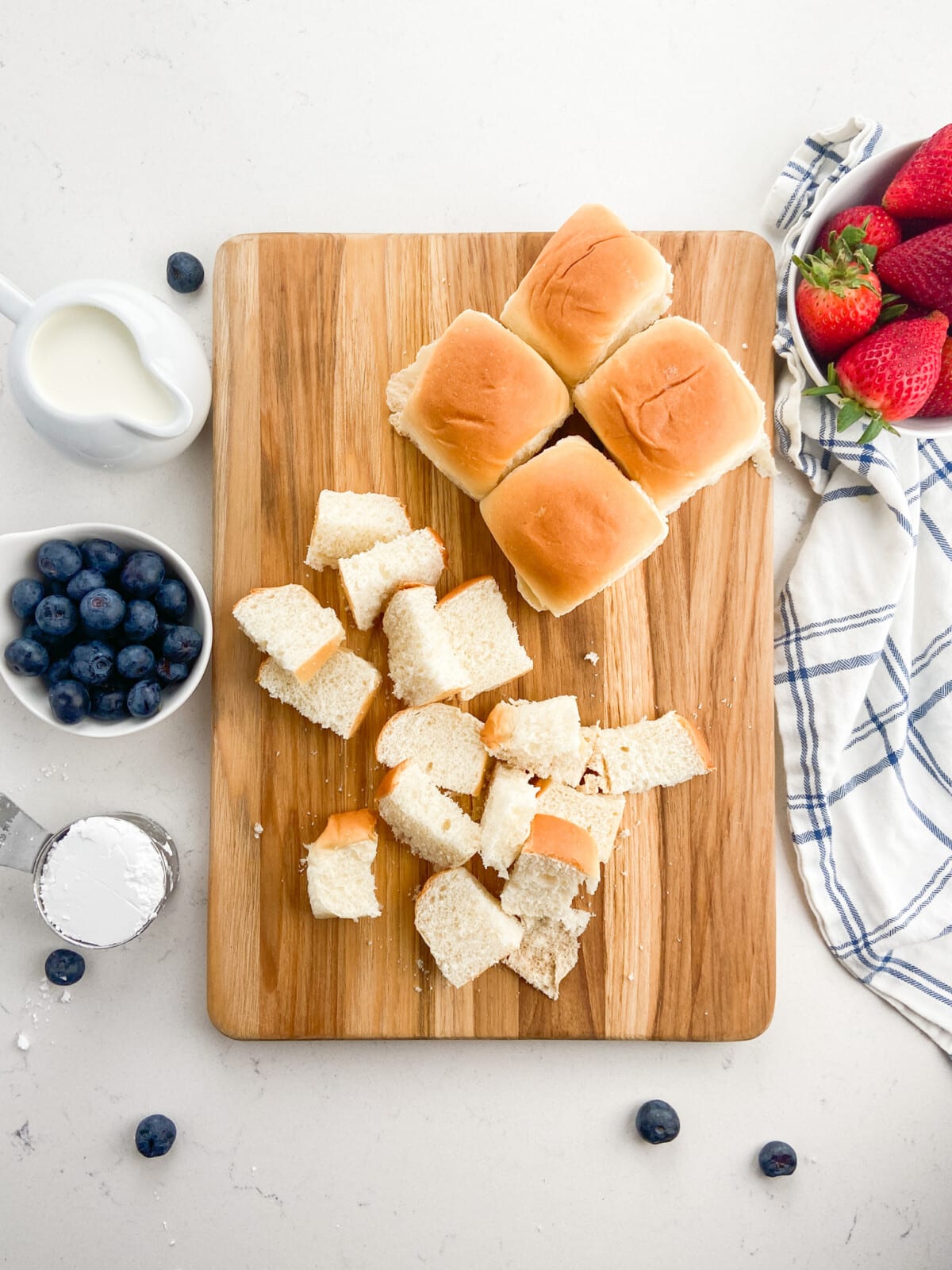 dinner rolls on cutting board sliced.