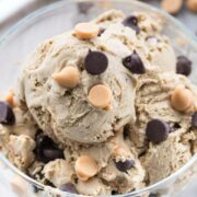 Overhead shot of peanut butter chip ice cream in glass dish