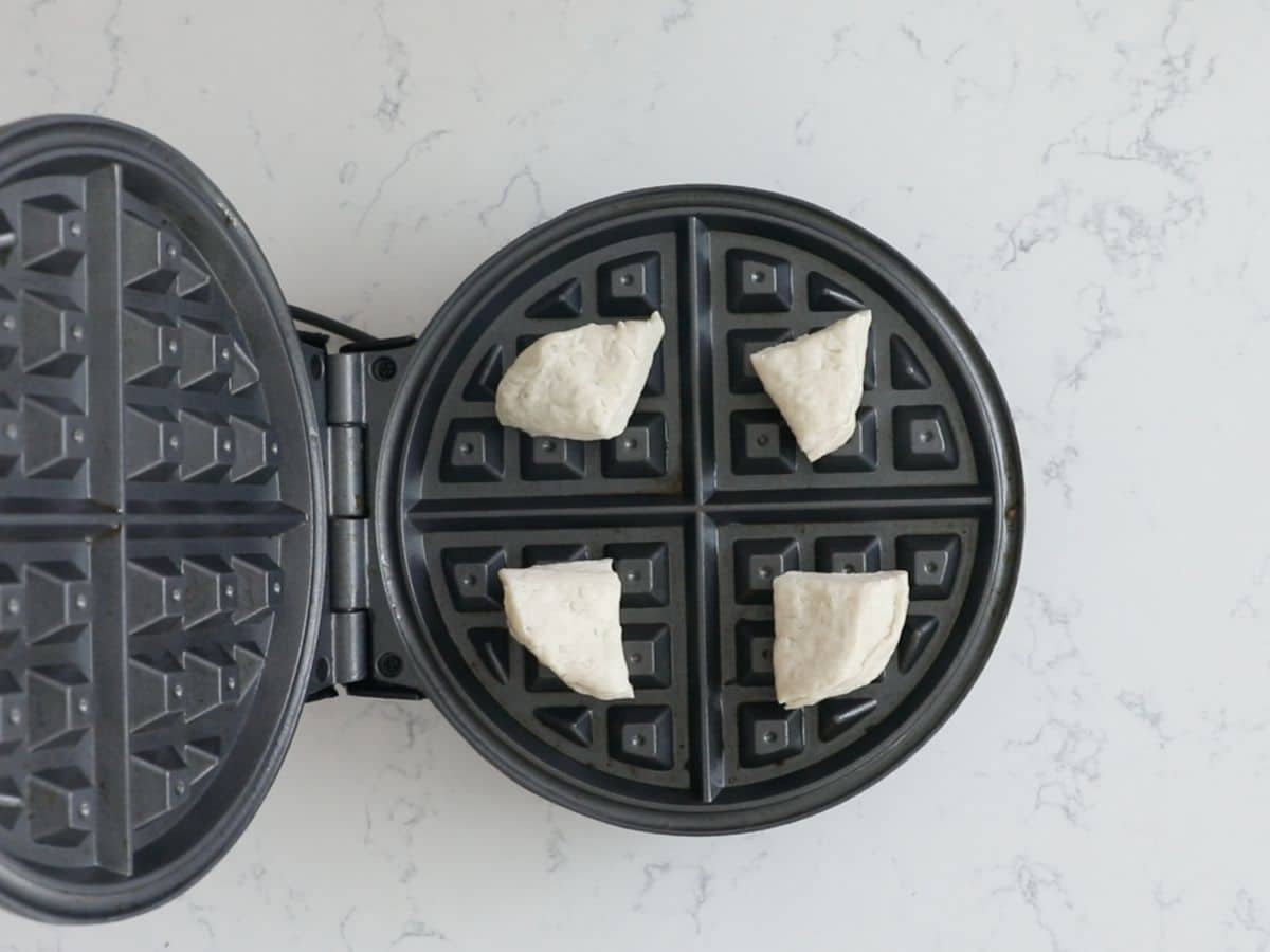 biscuit pieces on waffle maker.