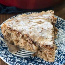 Apple fritter coffee cake slice on blue and white plate