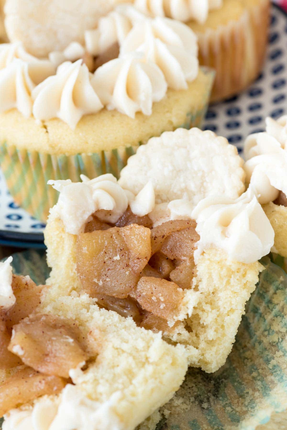 Apple Pie Cupcakes - easy homemade apple pie filling inside a soft vanilla cupcake topped off with a pie crust chip!