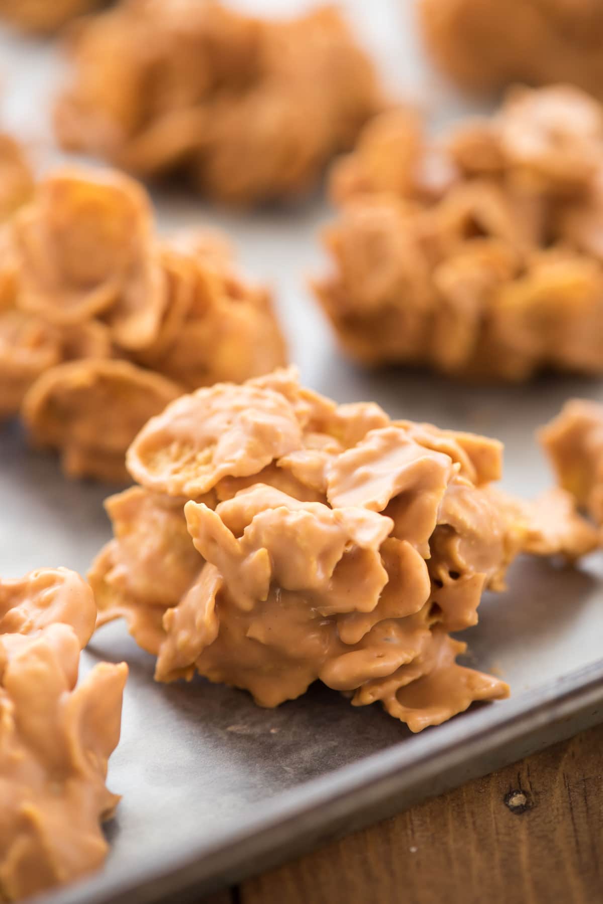 Butterscotch Peanut Butter Cornflake Clusters - this easy candy recipe has only 3 ingredients! Perfect for a quick no-bake snack or holiday cookie tray.