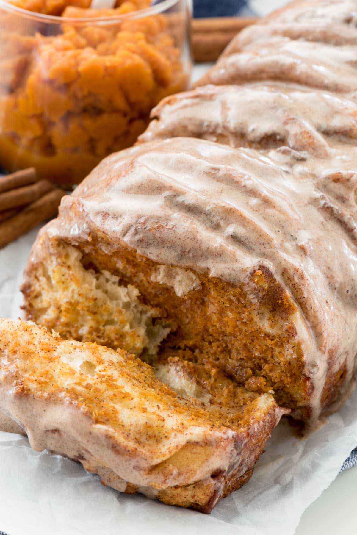 Easy Pumpkin Pull Apart Bread - this is the perfect pumpkin recipe! Refrigerated biscuits filled with pumpkin pie mixture - it's like pumpkin pie for breakfast!