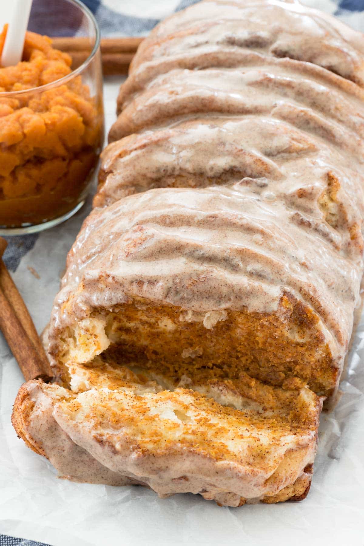 Easy Pumpkin Pull Apart Bread - this is the perfect pumpkin recipe! Refrigerated biscuits filled with pumpkin pie mixture - it's like pumpkin pie for breakfast!