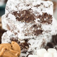 Stack of muddy buddy krispie treats with ingredients